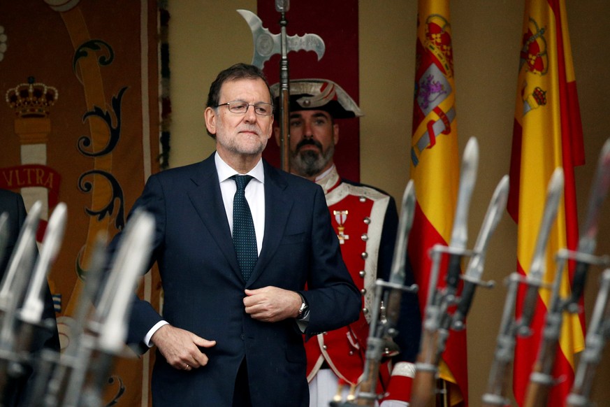Spain&#039;s acting Prime Minister and People&#039;s Party (PP) leader Mariano Rajoy attends a military parade marking Spain&#039;s National Day in Madrid, Spain October 12, 2016. REUTERS/Juan Medina