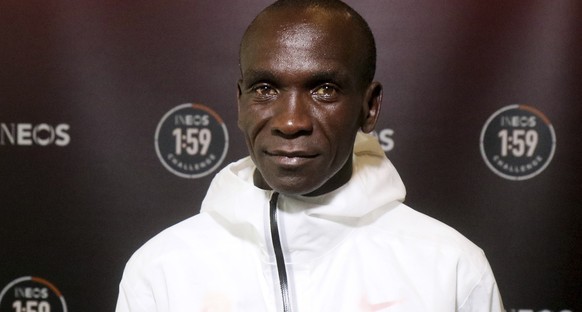 Marathon runner Eliud Kipchoge from Kenya poses for photographers prior to a press conference in Vienna, Austria, Thursday, Oct. 10, 2019. Kipchoge&#039;s attempt to run a sub two-hour marathon has be ...