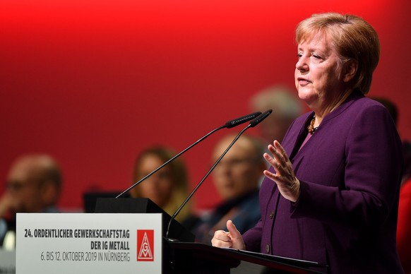 epa07909960 German chancellor Angela Merkel speaks at the IG Metall Gewerkschaftstag in Nuremberg, Germany, 10 October 2019. Germany&#039;s biggest workers union holds its 24th convention until saturd ...