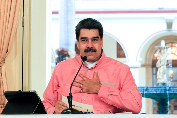 epa08466082 A handout photo made available by Miraflores Palace&#039;s Press office that shows President of Venezuela Nicolas Maduro speaking during a Government event, in Caracas, Venezuela, 04 June  ...