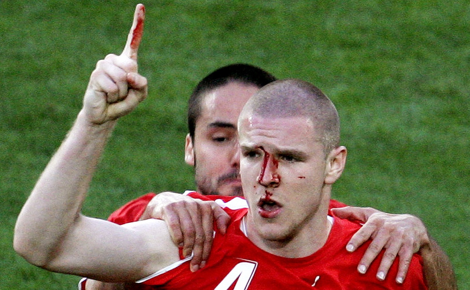 **RETRANSMISSION TO ALTERNATE CROP** Switzerland&#039;s Philippe Senderos, right, celebrates after scoring with teammate Ricardo Cabanas during the Switzerland v. South Korea 2006 World Cup Group G so ...