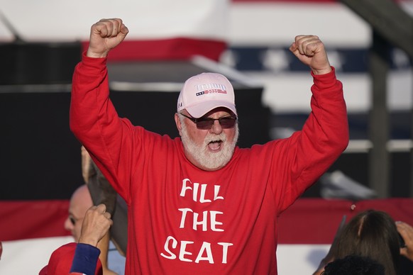 A supporter cheers along with the crowd to &quot;Fill That Seat&quot; before President Donald Trump speaks at a campaign rally, Monday, Sept. 21, 2020, in Swanton, Ohio. (AP Photo/Tony Dejak)