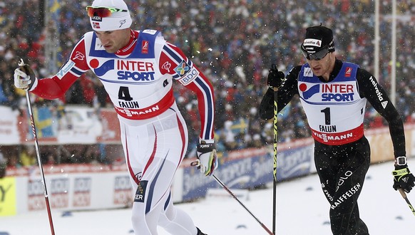 Switzerland&#039;s Dario Cologna in action behind Norway&#039;s Petter Northug during the men&#039;s 50 km classic mass start competition at the 2015 Nordic World Skiing Championships in Falun, Sweden ...