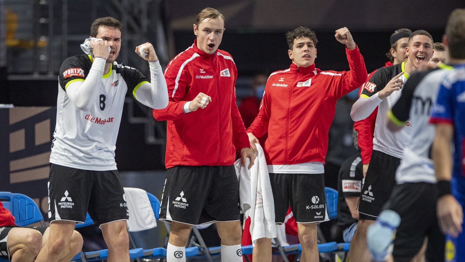 Switzerland&#039;s players react after a goal during the 27th Men&#039;s Handball World Championship 2021 Group E match betwen Switzerland and France in Madinat Sittah Uktubar in Egypt, on Monday, 18. ...