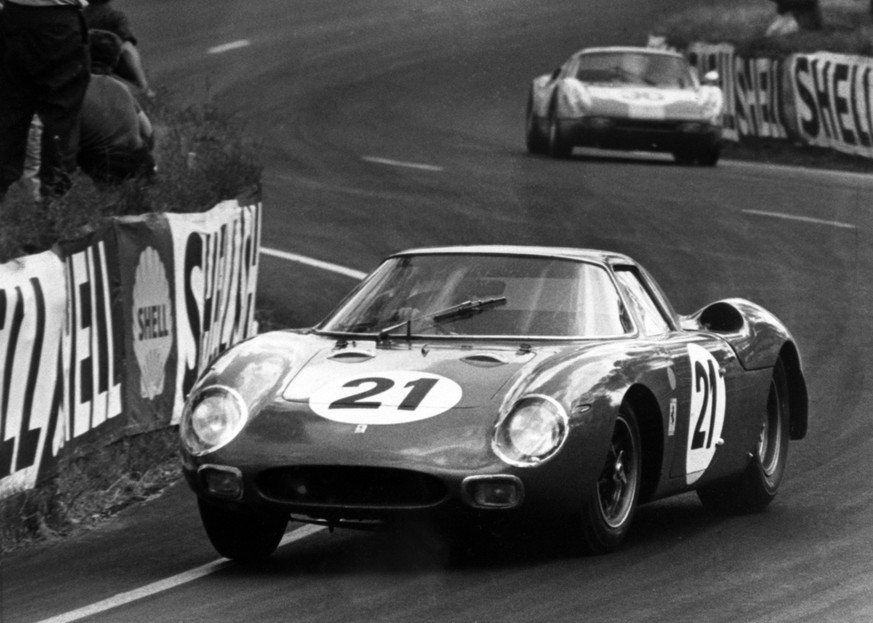 The North American racing team&#039;s 3.3 litre, 12 cyclinder, rear-engined Ferrari 250 LM, driven by Masten Gregory of the United States, and Jochen Rindt of Austria, on its way to victory in the 33r ...
