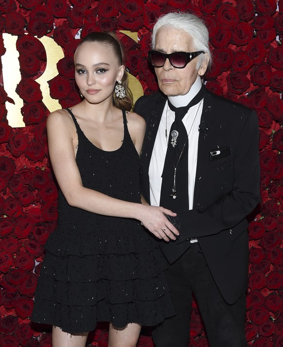 Actress and model Lily-Rose Depp and Chanel artistic director and honoree Karl Lagerfeld attend the 2nd Annual WWD Honors hosted by Women&#039;s Wear Daily at The Pierre Hotel on Tuesday, Oct. 24, 201 ...