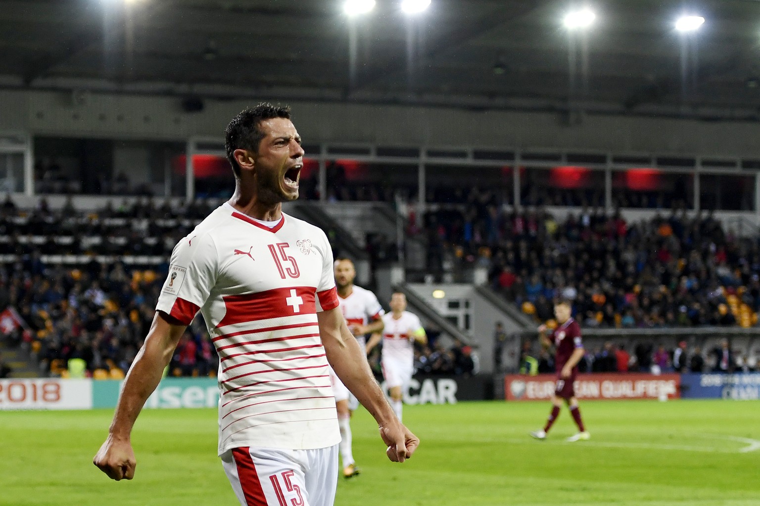 Swiss midfielder Blerim Dzemaili, celebrates after scoring the goal to the 0:2 during the 2018 Fifa World Cup group B qualifying soccer match Latvia against Switzerland at Skonto Stadium, in Riga, Lat ...