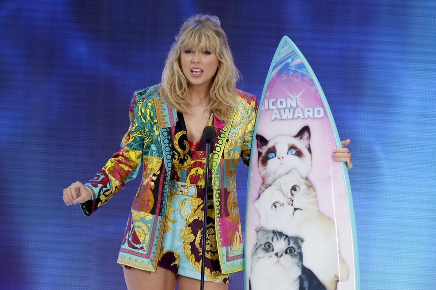 FILE - In this Aug. 11, 2019 file photo, Taylor Swift accepts the Icon award at the Teen Choice Awards in Hermosa Beach, Calif. Swift plans to re-record her songs after her catalog was purchased by po ...
