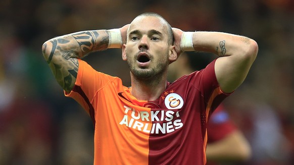 Galatasaray&#039;s Wesley Sneijder, reacts after a missing attack against Benfica during Champions League Group C soccer match between Galatasaray and Benfica at Turk Telekom Arena Stadium in Istanbul ...