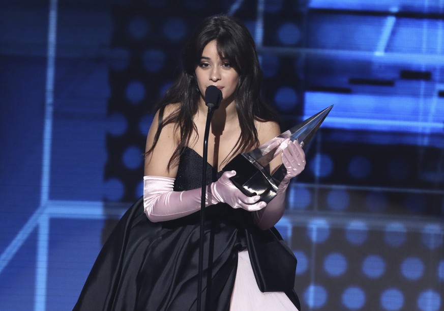 Camila Cabello accepts the award for new artist of the year at the American Music Awards on Tuesday, Oct. 9, 2018, at the Microsoft Theater in Los Angeles. (Photo by Matt Sayles/Invision/AP)