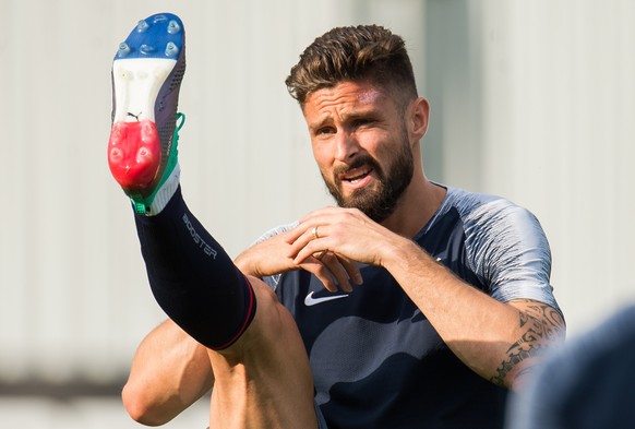 epa06888369 France player Olivier Giroud displays his French flag inspired soles during a training session held in Moscow, Russia, 14 July 2018. France will face Croatia in FIFA World Cup 2018 final o ...