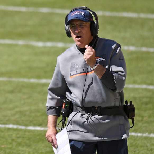 Denver Broncos head coach Vic Fangio walks the sideline during the first half of an NFL football game against the Pittsburgh Steelers in Pittsburgh, Sunday, Sept. 20, 2020. (AP Photo/Don Wright)