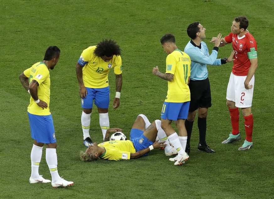 Brazil&#039;s Neymar reacts as he lies on the ground during the group E match between Brazil and Switzerland at the 2018 soccer World Cup in the Rostov Arena in Rostov-on-Don, Russia, Sunday, June 17, ...