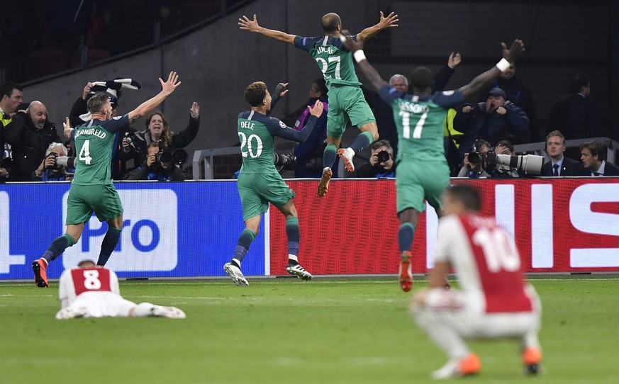 Tottenham players celebrate at the end of the Champions League semifinal second leg soccer match between Ajax and Tottenham Hotspur at the Johan Cruyff ArenA in Amsterdam, Netherlands, Wednesday, May  ...