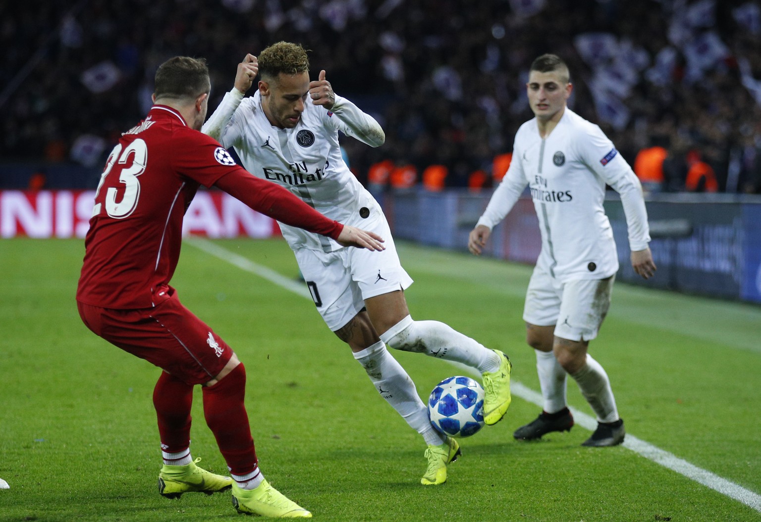PSG forward Neymar, right, challenges for the ball with Liverpool midfielder Xherdan Shaqiri during a Champions League Group C soccer match between Paris Saint Germain and Liverpool at the Parc des Pr ...