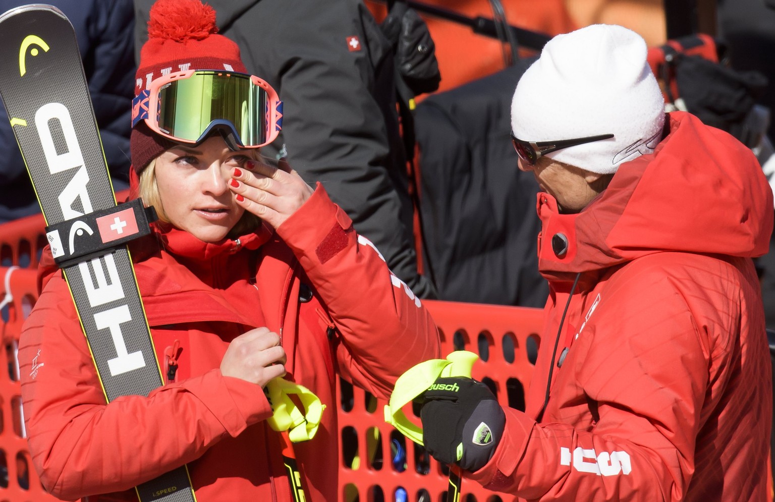 epa06534988 Lara Gut (L) of Switzerland reacts next to her father and coach, Pauli Gut, during the Women&#039;s Super-G race at the Jeongseon Alpine Centre during the PyeongChang 2018 Olympic Games, S ...