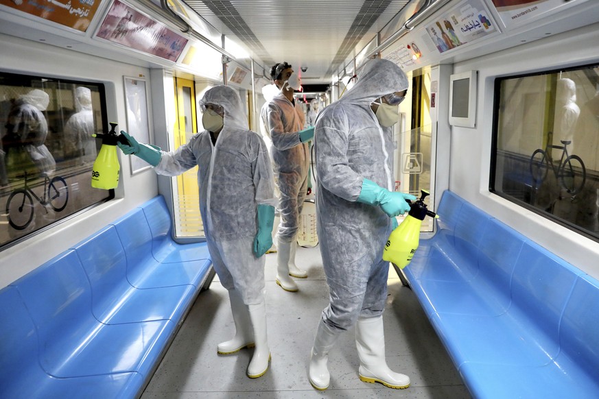 Workers disinfect subway trains against coronavirus in Tehran, Iran, in the early morning of Wednesday, Feb. 26, 2020. Iran&#039;s government said Tuesday that more than a dozen people had died nation ...