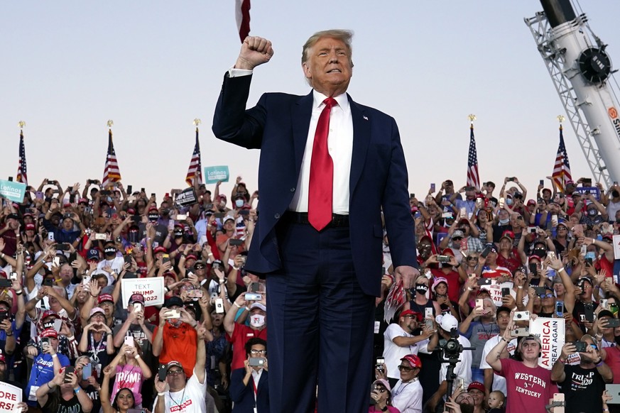 President Donald Trump arrives for a campaign rally at Orlando Sanford International Airport, Monday, Oct. 12, 2020, in Sanford, Fla. (AP Photo/Evan Vucci)
Donald Trump
