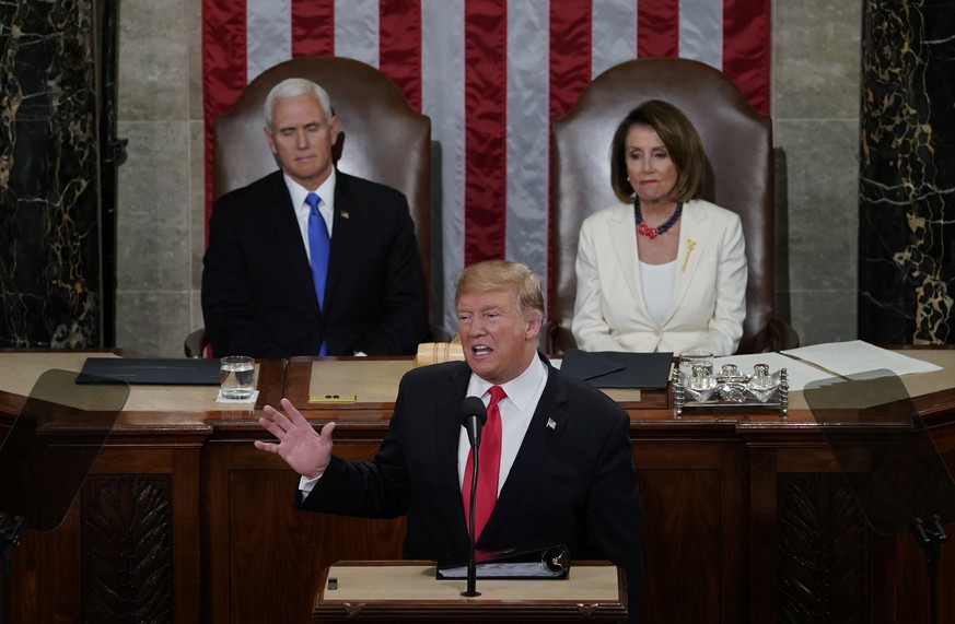 President Donald Trump delivers his State of the Union address to a joint session of Congress on Capitol Hill in Washington, as Vice President Mike Pence and Speaker of the House Nancy Pelosi, D-Calif ...