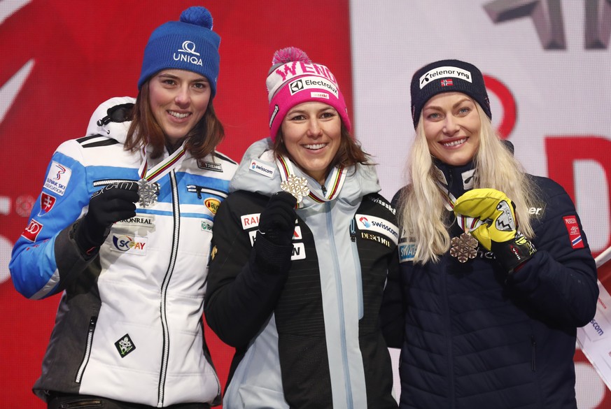 Switzerland&#039;s Wendy Holdener, center, winner of the women&#039;s combined, poses with second placed Slovakia&#039;s Petra Vlhova, left, and third placed Norway&#039;s Ragnhild Mowinckel, during t ...
