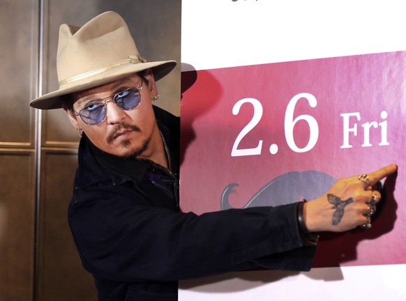FILE - In this Jan. 28, 2015 file photo, U.S. actor Johnny Depp poses for photographers during a photo session prior to a press conference to promote his latest film &quot;Mortdecai&quot; in Tokyo. Au ...