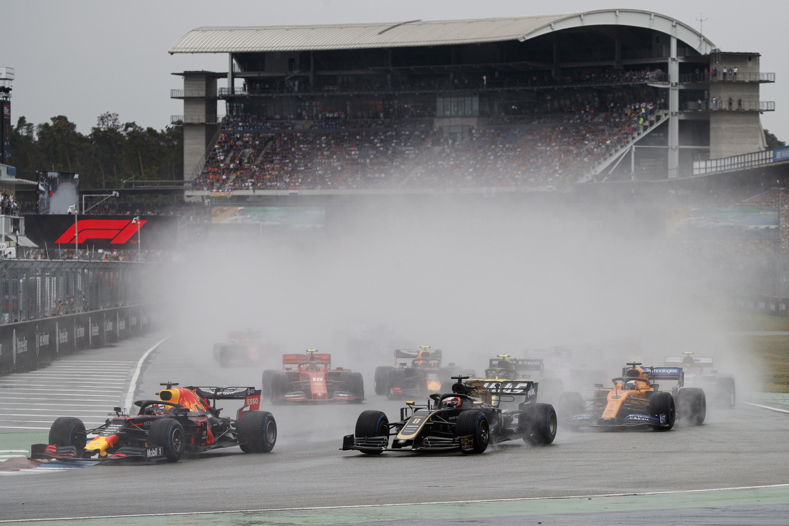 epa07745921 Dutch Formula One driver Max Verstappen of Aston Martin Red Bull Racing (L) in action during the 2019 German Formula One Grand Prix at the Hockenheimring in Hockenheim, Germany, 28 July 20 ...