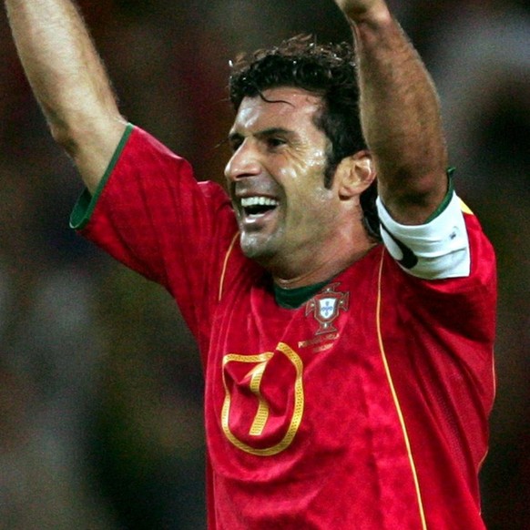 Portugal&#039;s captain Luis Figo celebrates at the end of the Euro 2004 semi final match between Portugal and Netherlands at the Jose de Alvalade stadium in Lisbon on Wednesday, 30 June 2004. Portuga ...
