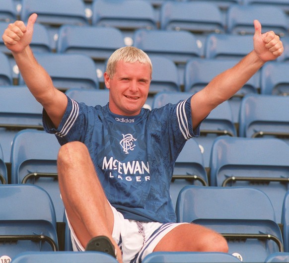 10 JUL 1995: PAUL GASCOIGNE POSES IN THE SHIRT OF HIS NEW CLUB GLASGOW RANGERS AFTER SIGNING FOR THE SCOTTISH SIDE FROM LAZIO OF ITALY. Mandatory Credit: David Rogers/ALLSPORT