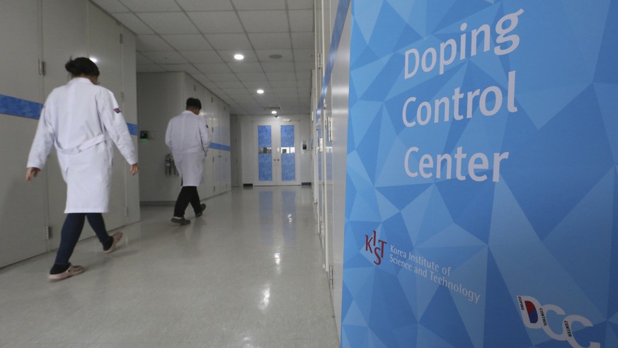 Researches enter into the Doping Control Center at the Korea Institute of Science and Technology in Seoul, South Korea, Monday, Feb. 19, 2018. Russia could lose its chance to be reinstated before the  ...