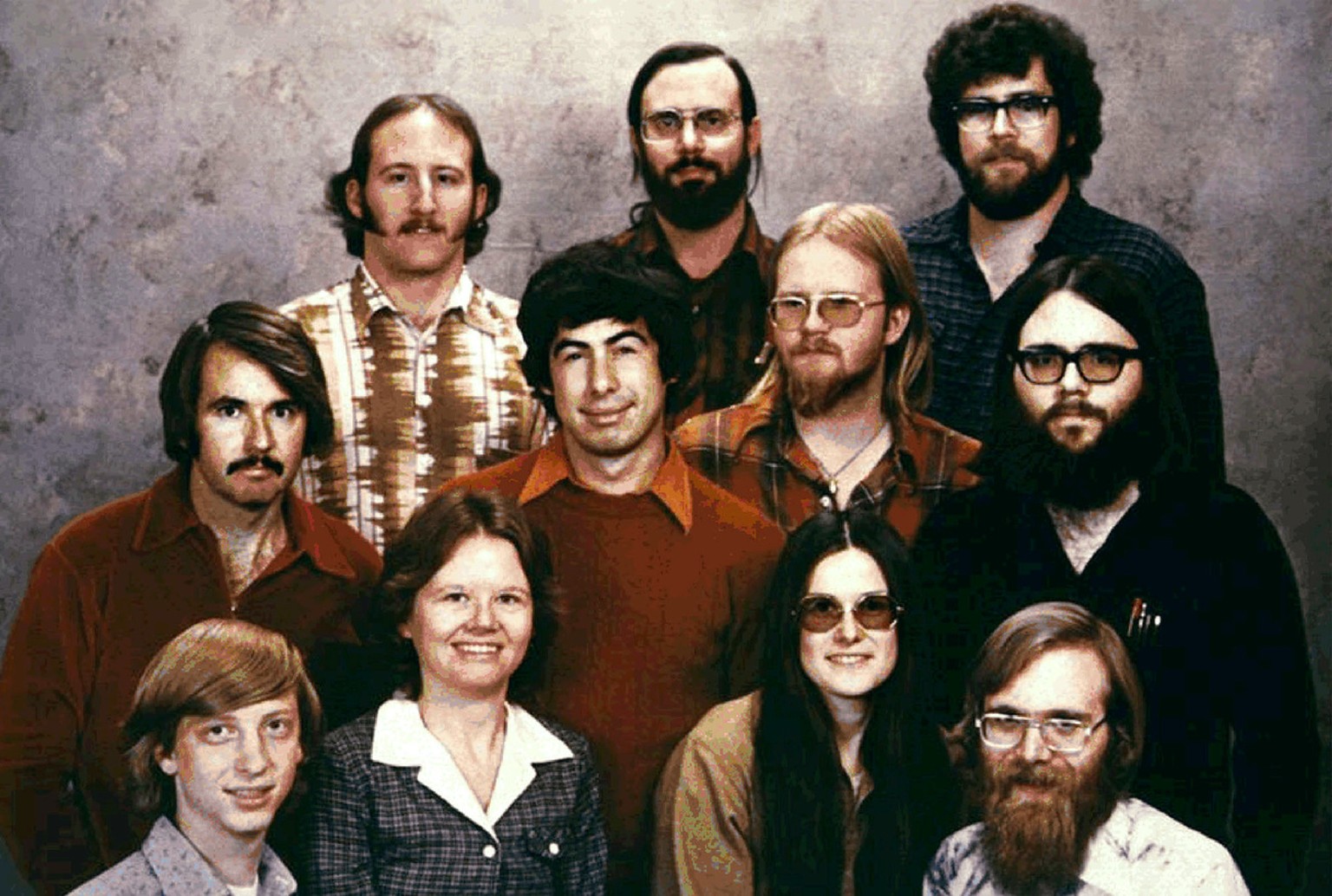 This is a 1978 photo of the 11 people who started Microsoft Corp., made in Albuquerque, N.M., just prior to moving the company to the Seattle area. Shown, top row from left, are: Steve Wood, Bob Walla ...