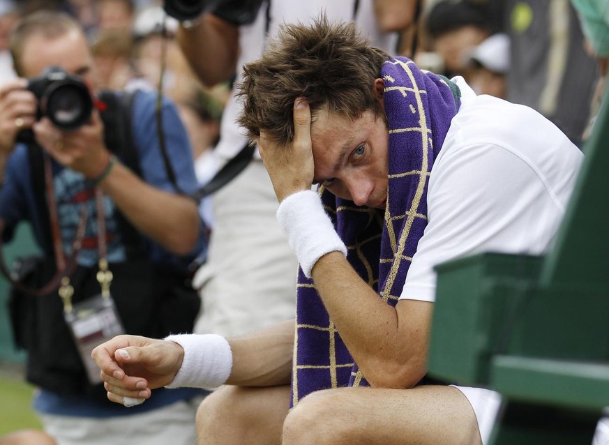 FILE - This June 24, 2010, file photo shows France&#039;s Nicolas Mahut sitting in his chair courtside following his loss to John Isner of the U.S. in their record-breaking men&#039;s singles match at ...