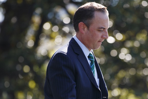 White House Chief of Staff Reince Priebus walks to board Marine One on the South Lawn of the White House in Washington, Wednesday, May 17, 2017, to join President Donald Trump for a short trip to Andr ...