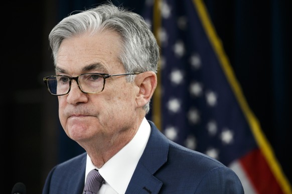 FILE - In this Tuesday, March 3, 2020 file photo, Federal Reserve Chair Jerome Powell pauses during a news conference to discuss an announcement from the Federal Open Market Committee, in Washington.  ...