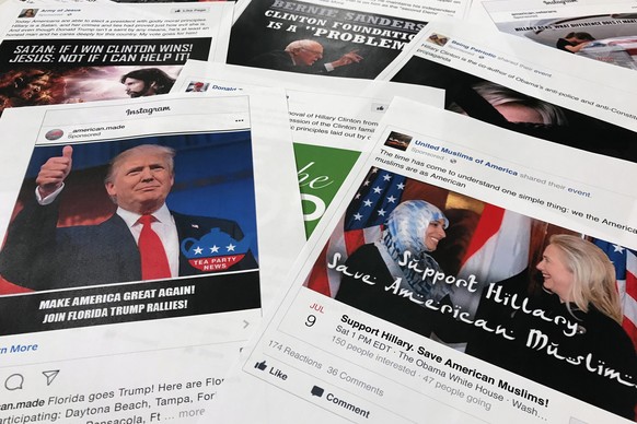 FILE - In this Nov. 1, 2017, file photo, Some of the Facebook and Instagram ads linked to a Russian effort to disrupt the American political process and stir up tensions around divisive social issues, ...