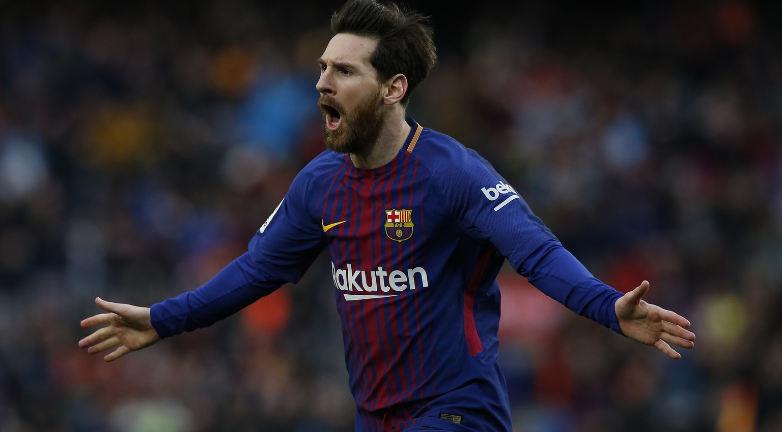 FC Barcelona&#039;s Lionel Messi reacts after scoring during the Spanish La Liga soccer match between FC Barcelona and Atletico Madrid at the Camp Nou stadium in Barcelona, Spain, Sunday, March 4, 201 ...