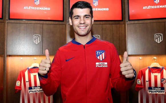 epa07328190 A handout picture provided by Atletico de Madrid, shows forward Alvaro Morata posing as a new Atletico&#039;s player in Madrid, Spain, 28 January 2019. Morata joins Atletico de Madrid on l ...