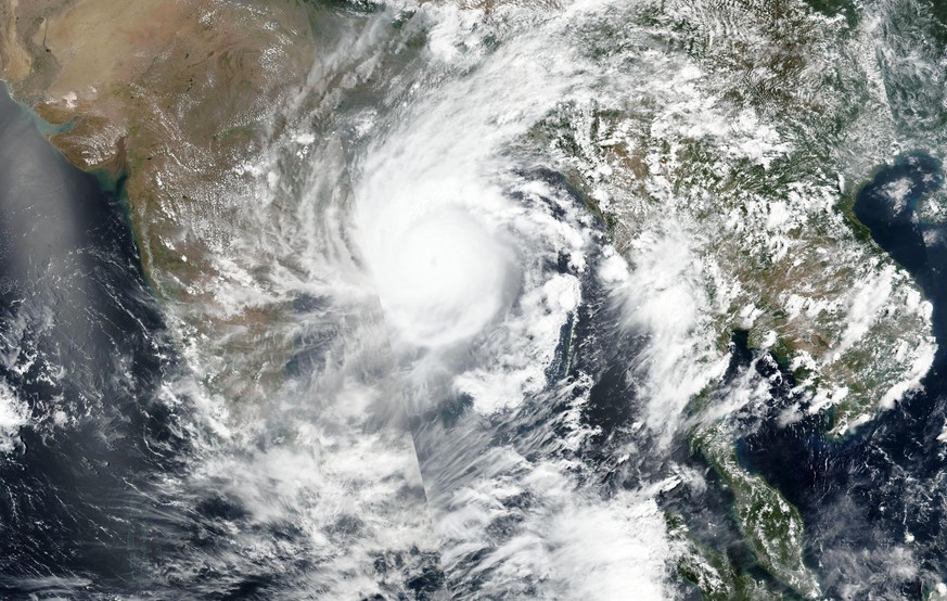 This Tuesday, May 19, 2020, satellite image released by NASA shows Cyclone Amphan over the Bay of Bengal in India. The powerful storm is expected to make landfall on Wednesday afternoon, May 20, 2020, ...
