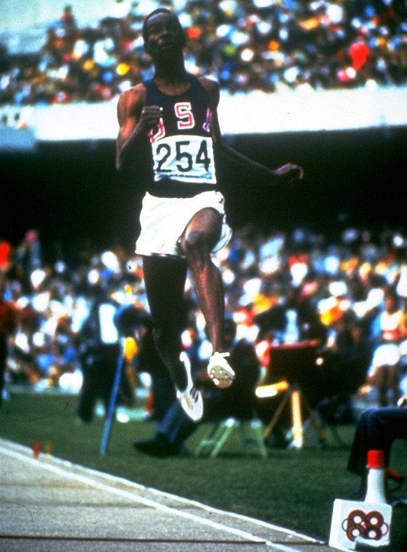 Bob Beamon is shown in his record-breaking long jump that won him a gold medal on October 18, 1968 during the 1968 Olympics in Mexico City. (AP Photo)