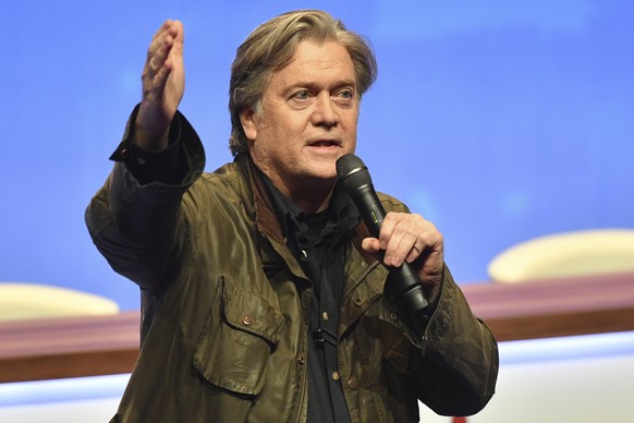 Former White House strategist Steve Bannon addresses members of the far right National Front party at the party congress in the northern French city of Lille, Saturday, March 10, 2018. Former White Ho ...