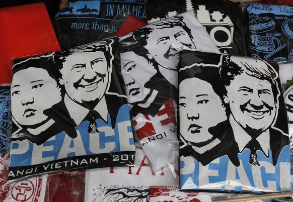 CORRECTS DATE - T-shirts with portraits of U.S. President Donald Trump and North Korean leader Kim Jong Un are displayed in a tourist area in Hanoi, Vietnam Sunday, Feb. 24, 2019. The second summit be ...