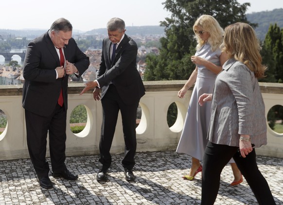 U.S. Secretary of State Mike Pompeo, left, his wife Susan Pompeo, right, the Prime Minister of Czech Republic Andrej Babis, second left, and his wife Monika Babis, second right, arrive for a group pho ...