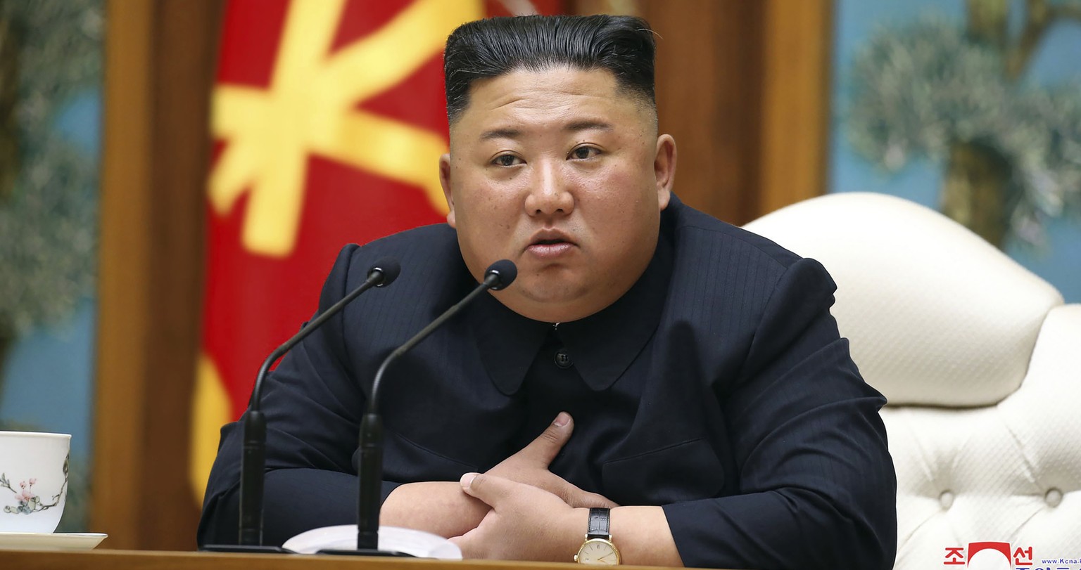 FILE - In this Saturday, April 11, 2020, file photo provided by the North Korean government, North Korean leader Kim Jong Un attends a politburo meeting of the ruling Workers&#039; Party of Korea in P ...