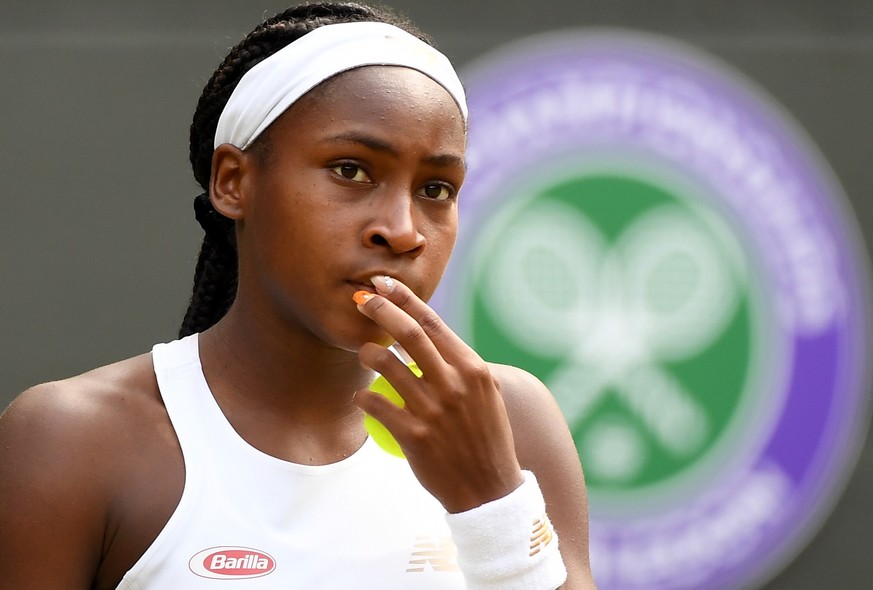epa07703724 Cori Gauff of the USA in action against Simona Halep of Romania during their fourth round match for the Wimbledon Championships at the All England Lawn Tennis Club, in London, Britain, 08  ...