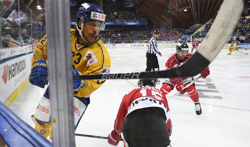 Davos&#039; Samuel Guerra, left, during the game between Team Canada and HC Davos, at the 93th Spengler Cup ice hockey tournament in Davos, Switzerland, Saturday, December 28, 2019. (KEYSTONE/Gian Ehr ...