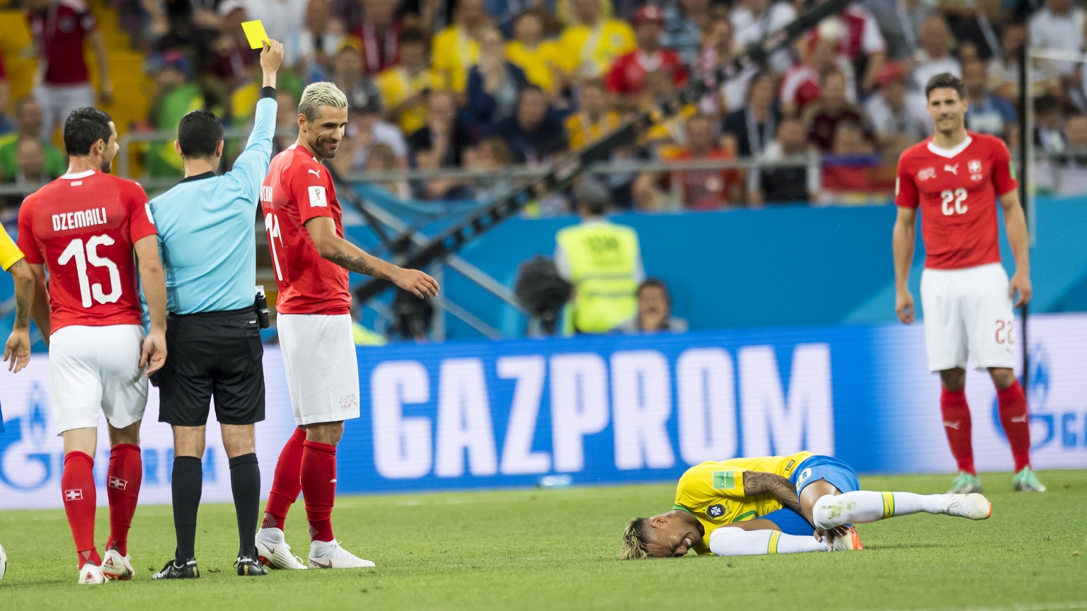 Switzerland&#039;s midfielder Valon Behrami, 3rd left, reacts next to Brazil&#039;s forward Neymar, right, during the FIFA soccer World Cup 2018 group E match between Switzerland and Brazil at the Ros ...