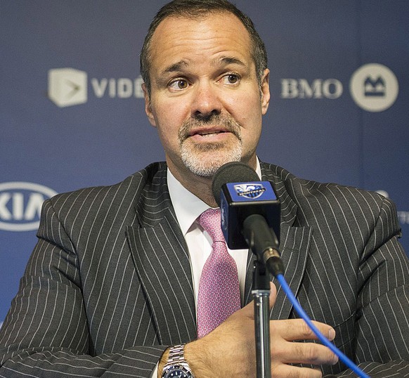 FILE - In this Oct. 3, 2014 file photo Montreal Impact soccer club owner and president Joey Saputo speaks during a news conference in Montreal. Cash-strapped Serie B club Bologna is nearing a deal on  ...