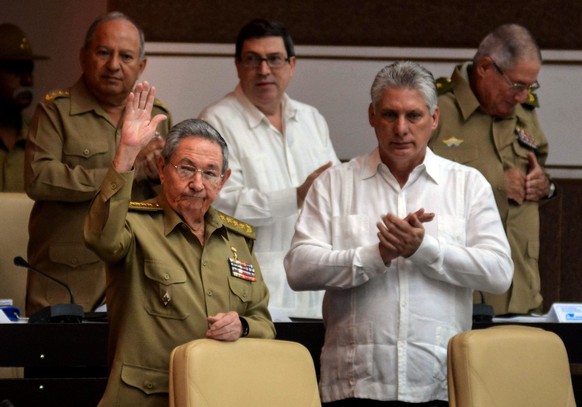 epa05689580 A handout photo made available by Cuban News Agency shows the President of Cuba, Raúl Castro (L), and the first vice president, Miguel Díaz-Canel (R), attend to the session of the National ...