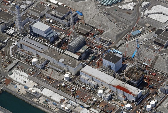 FILE - This April 23, 2019, file photo shows the Fukushima Dai-ichi nuclear power plant in Okuma town, Fukushima prefecture, northeastern Japan, where decommissioning work is underway. A Japanese high ...