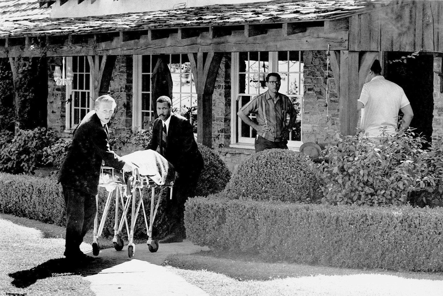 FILE - This Aug. 9, 1969 file photo shows the body of actress Sharon Tate being taken from her rented house on Cielo Drive in the Bel Air Estates area of Los Angeles. Cult leader Charles Manson, who d ...