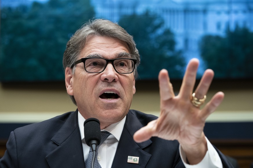 FILE - In this May 9, 2019, file photo, Energy Secretary Rick Perry testifies before the House Energy and Commerce Committee on his future budget request, on Capitol Hill in Washington. A business exe ...